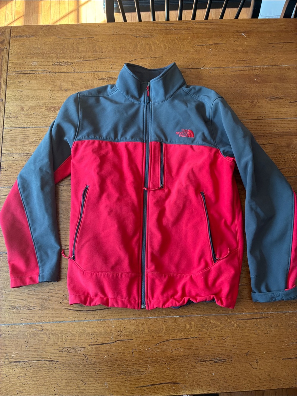 The North Face men’s Two-Tone Red and Gray Puffer Jacket